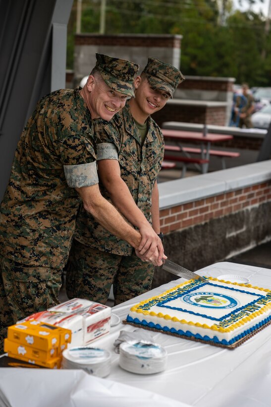 Marines, Sailors and civilians with Marine Forces Special Operations Command celebrate the U.S. Navy’s 247th Birthday at Camp Lejeune, North Carolina, Oct. 13, 2022. Senior Navy leaders talked to the Marines and Sailors about naval history and traditions and the importance of the Navy-Marine Corps team at MARSOC. “As we reflect on our shared history and heritage, let us remember the sacrifices of those who sailed before us to keep the seas free and open,” said Chief of Naval Operations, Adm. Mike Gilday in his message celebrating the Navy's 247th Birthday. (U.S. Marine Corps photo by Sgt. Brennan Priest)