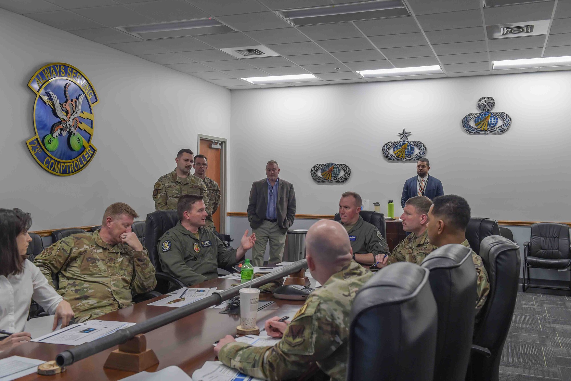 Leadership from across the 23rd Wing and local community members discuss a project that was presented during a Spark Tank competition at Moody Air Force Base, Georgia, March 24, 2023. Between each presentation evaluators discussed challenges and offered insight among themselves. (U.S. Air Force photo by Airman 1st Class Briana Beavers)