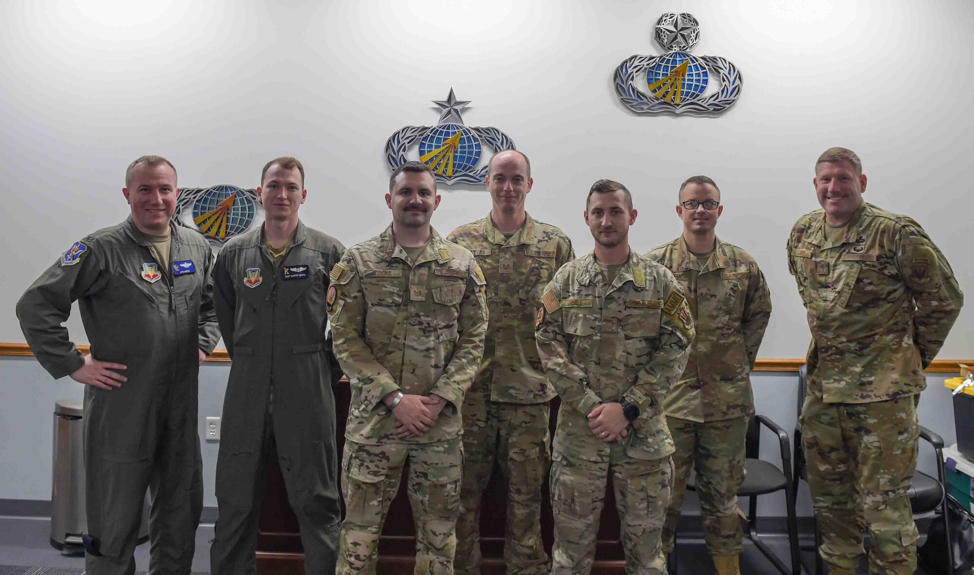 U.S. Air Force Col. Ryan Hayde, 23rd Wing vice commander, far left, and Chief Master Sgt. Justin Geers, 23rd Wing command chief, far right, stand with Spark Tank competition presenters at Moody Air Force Base, Georgia, March 24, 2023. The five finalists were selected from across the base to present ideas to the 23rd Wing Leadership and an innovation advisory panel. (U.S. Air Force photo by Airman 1st Class Briana Beavers)