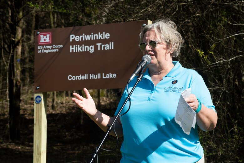 Natasha Deane, chairperson of Friends of Cordell Hull Lake, welcomes visitors to Periwinkle Hiking Trail during a dedication ceremony March 25, 2023, at the Indian Creek Archery Range Trailhead in Granville, Tennessee. (USACE Photo by Lee Roberts)