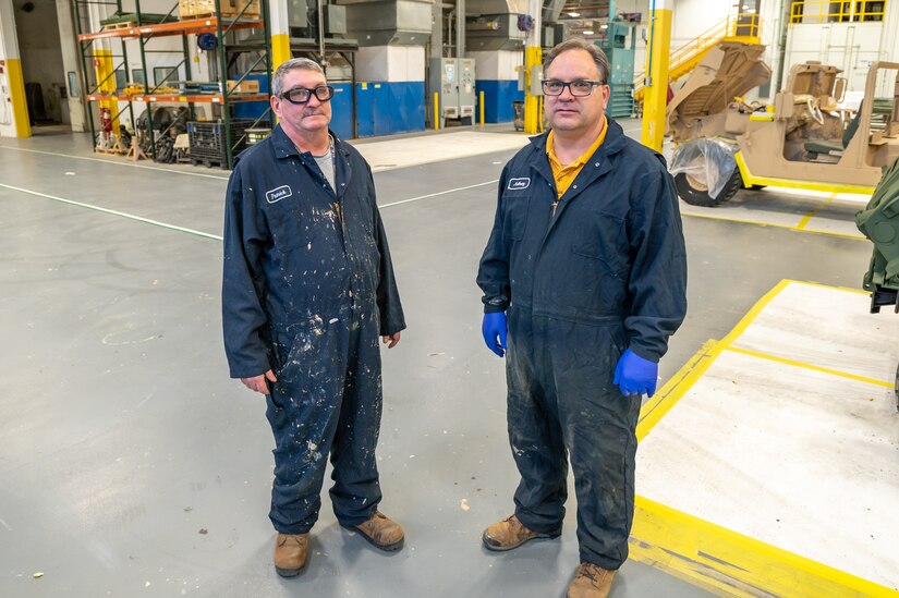 Photo of 2 employees from the C4ISR Paint Branch