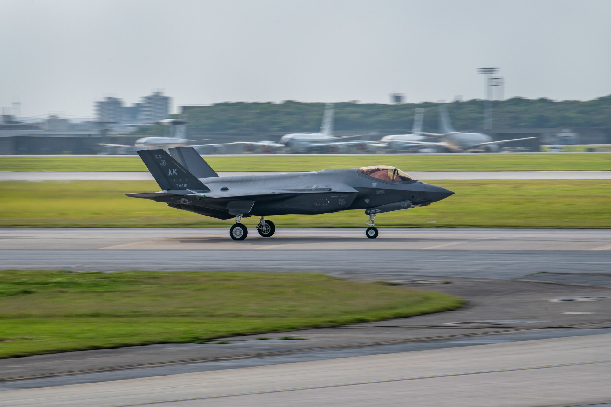 Jet lands on a runway.