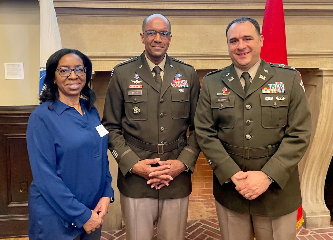 Lt. Col. Jeffrey Beeman, Los Angeles District deputy commander, right, joins Funke Ojuri, the chief of the LA District’s Design Branch, left, to meet and pose for a photo with Gen. Gary Brito, commanding general of U.S. Army Training and Doctrine Command, during the March 7 Community Partners Meeting in downtown LA.