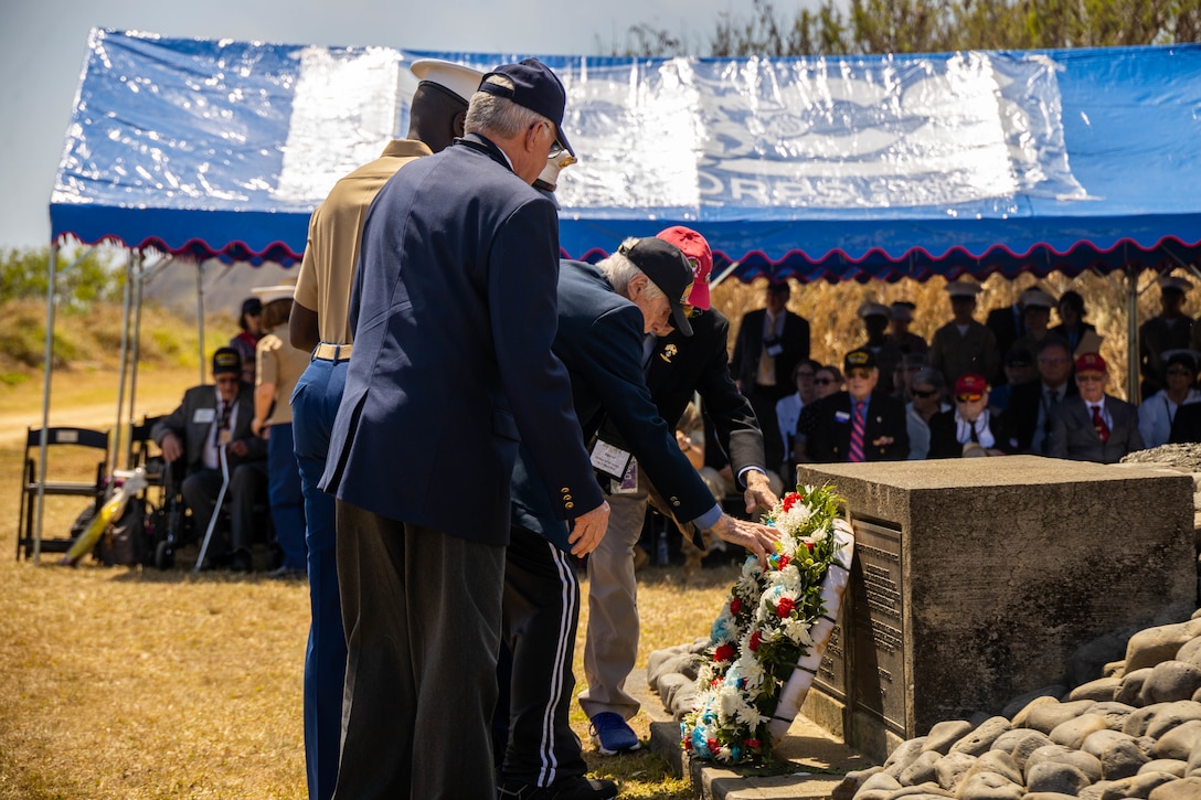 Veterans of the Battle of Iwo Jima lay a ceremonial wreath during the 78th Reunion of Honor ceremony, Iwo To, Japan, March 25, 2023.  The Reunion of Honor ceremony is held annually to bring together leaders from the U.S. and Japan, veterans, distinguished guests, and their family members to pay tribute to service members lost during the Battle of Iwo Jima, and is a testament to the ironclad U.S.-Japan alliance which has blossomed over the past 78 years.