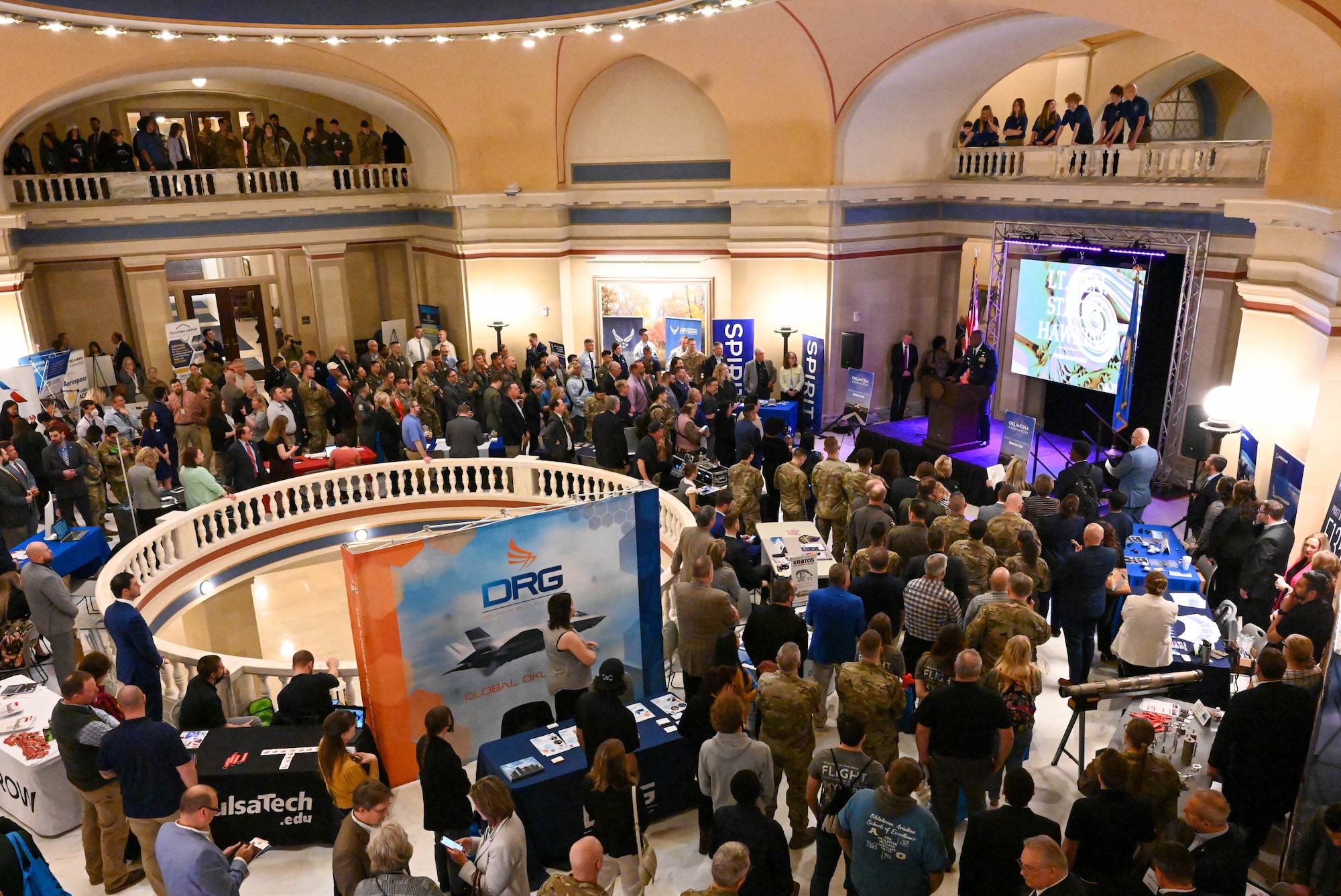 Visitors move about at the 2023 AERO Oklahoma Aviation, Aerospace and Defense Awareness expo at the Oklahoma State Capitol, March 22, 2023. Nearly 30 Airmen from Altus Air Force Base, Oklahoma, attended the event. (U.S. Air Force photo by Senior Airman Trenton Jancze)