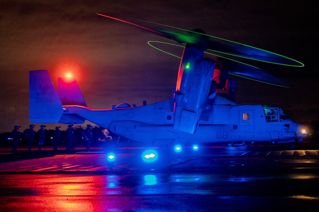 U.S. Marines with the 26th Marine Expeditionary Unit (MEU), board a MV-22 Osprey prior to conducting a simulated tactical recovery of aircraft personnel (TRAP) during MEU Exercise III on Marine Corps Auxiliary Field Bogue, North Carolina, March 10, 2023. TRAP is a contingency mission utilized to rapidly respond to downed aircraft, and to recover personnel from isolated locations during deployment. (U.S. Marine Corps photo by Cpl. Nayelly Nieves-Nieves)