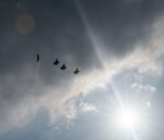 Four U.S. Air Force F-35A Lightning IIs assigned to the 354th Fighter Wing at Eilson Air Force Base, Alaska, fly in formation over Kadena Air Base, Japan, March 28, 2023. While deployed to the Keystone of the Pacific, the F-35s will work in conjunction with other fighter units at Kadena to ensure continued steady-state fighter capabilities.
