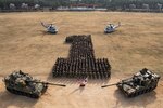 Marines from the Republic of Korea 1st Marine Division, ROK Marine Aircraft Group, U.S. 1st Marine Division, and 1st Marine Aircraft Wing take a group photo during Freedom Shield 2023 at ROK Marine Corps Base Pohang, South Korea, March 21, 2023. Freedom shield is a defense-oriented exercise designed to strengthen the ROK-U.S. Alliance, enhance our combined defense posture, and strengthen security and stability on the Korean peninsula.