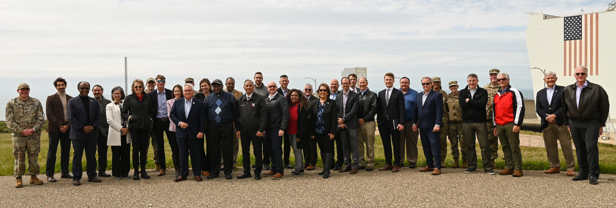 The Governor's Military Council poses for a photo near space launch complex 6 at Vandenberg Space Force Base, Calif., March 28, 2023. The Governor's Military Council was established in 2013 by Gov. Edmund G. Brown Jr. to support the military in California with a focus on growing defense and national security missions in state administration. (U.S. Space Force photo by Senior Airman Tiarra Sibley)