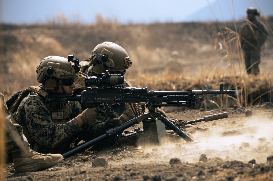 U.S. Marines with Battalion Landing Team 1/5, 31st Marine Expeditionary Unit, fire an M240B machine gun during a live-fire exercise on Combined Arms Training Center Camp Fuji, Shizuoka Prefecture, Japan, Mar. 11, 2022. Live-fire drills and exercises keep Marines consistent in the execution of their roles within their squads. Maritime Defense Exercise Amphibious Rapid Deployment Brigade is a bilateral exercise meant to increase interoperability and strengthen ties between U.S. and Japanese forces for the defense of Japan. (U.S. Marine Corps photo by Lance Cpl. Cesar Ronaldo Alarcon)