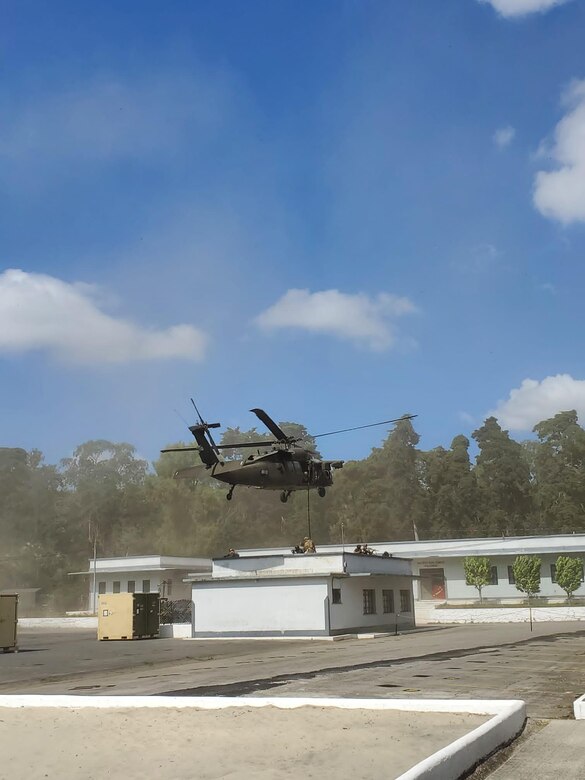 A UH-60 Black Hawk participates in a demonstration of capabilities near the end of CENTAM GUARDIAN in Guatemala City, Guatemala Mar 26, 2023. CENTAM GUARDIAN is an annual exercise designed to build humanitarian assistance/disaster response functional capacity, enhance readiness to combat common threats, and promote cooperation and interoperability between participating forces.