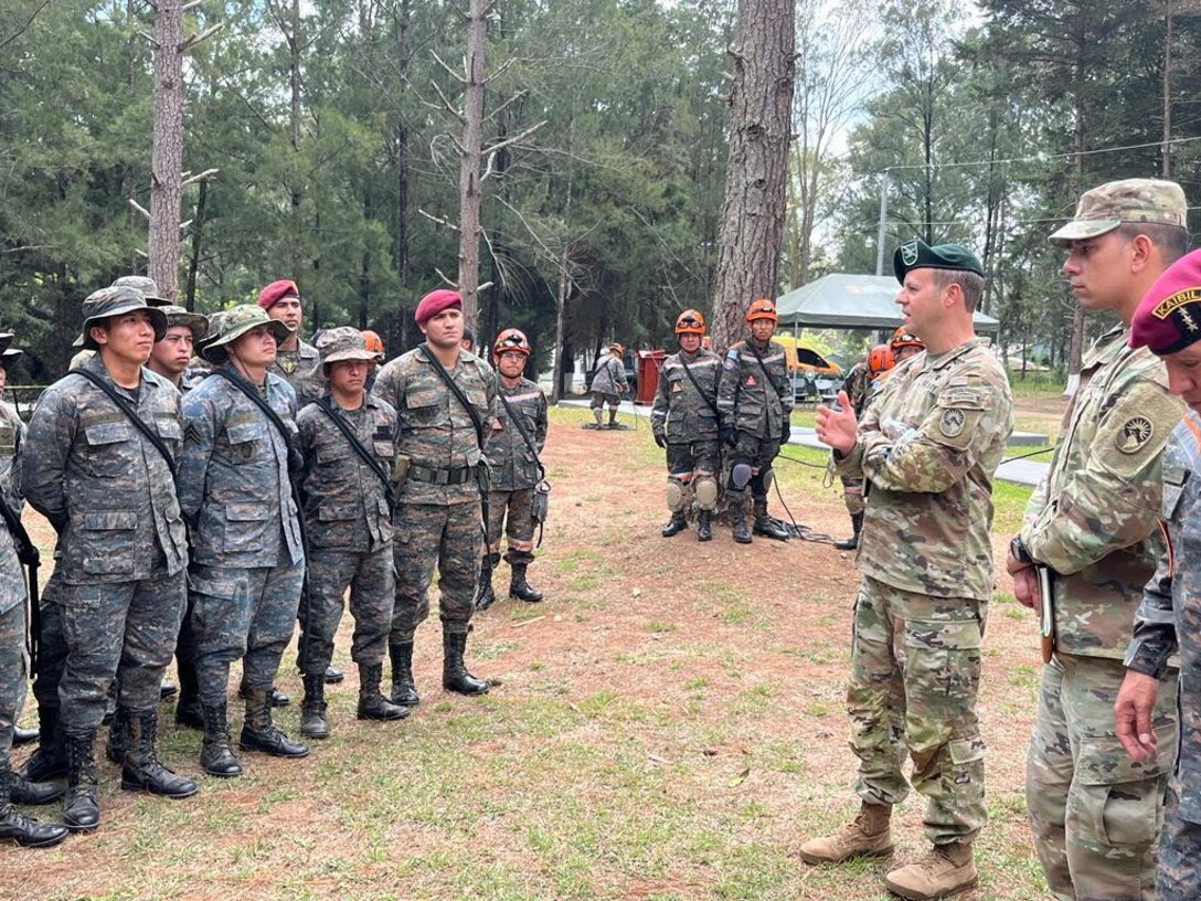 U.S. Army COL Phillip Brown, Joint Task Force commander, speaks with soldiers from the Batallon Humanitario y de Rescate following their demonstration and commends them on their hard work to ensure their home country is safe Mar 27, 2023. Joint Task Force Bravo Commander visits with regional partners and Civil Affairs teams in Guatemala from 22 - 29 March 2023 to reaffirm the task forces commitment to our regional partners and discuss how to strengthen respective partnerships.