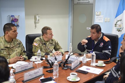 U.S. Army COL Phillip Brown, Joint Task Force commander, listens to a capabilities brief with Coordinadora Nacional Para La Reduccion de Desastres (COMRAD) Director Oscar Estuardo Cossio to learn what the organization is capable of and how JTF-Bravo can strengthen its partnership Mar 28, 2023. Joint Task Force Bravo Commander visits with regional partners and Civil Affairs teams in Guatemala from 22 - 29 March 2023 to reaffirm the task forces commitment to our regional partners and discuss how to strengthen respective partnerships.