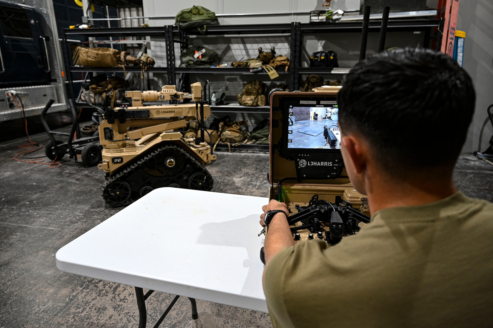 U.S. Air Force Senior Airman Tyler Copley, 49th Civil Engineer Squadron explosive ordnance disposal journeyman, maneuvers a L3 Harris T7 Multi-Mission Robotic System at Holloman Air Force Base, New Mexico, March 23, 2023. The EOD flight uses the T7 robot to undertake hazardous material cleanups and other dangerous missions that are too high-risk for human intervention. (U.S Air Force photo by Airman 1st Class Isaiah Pedrazzini)