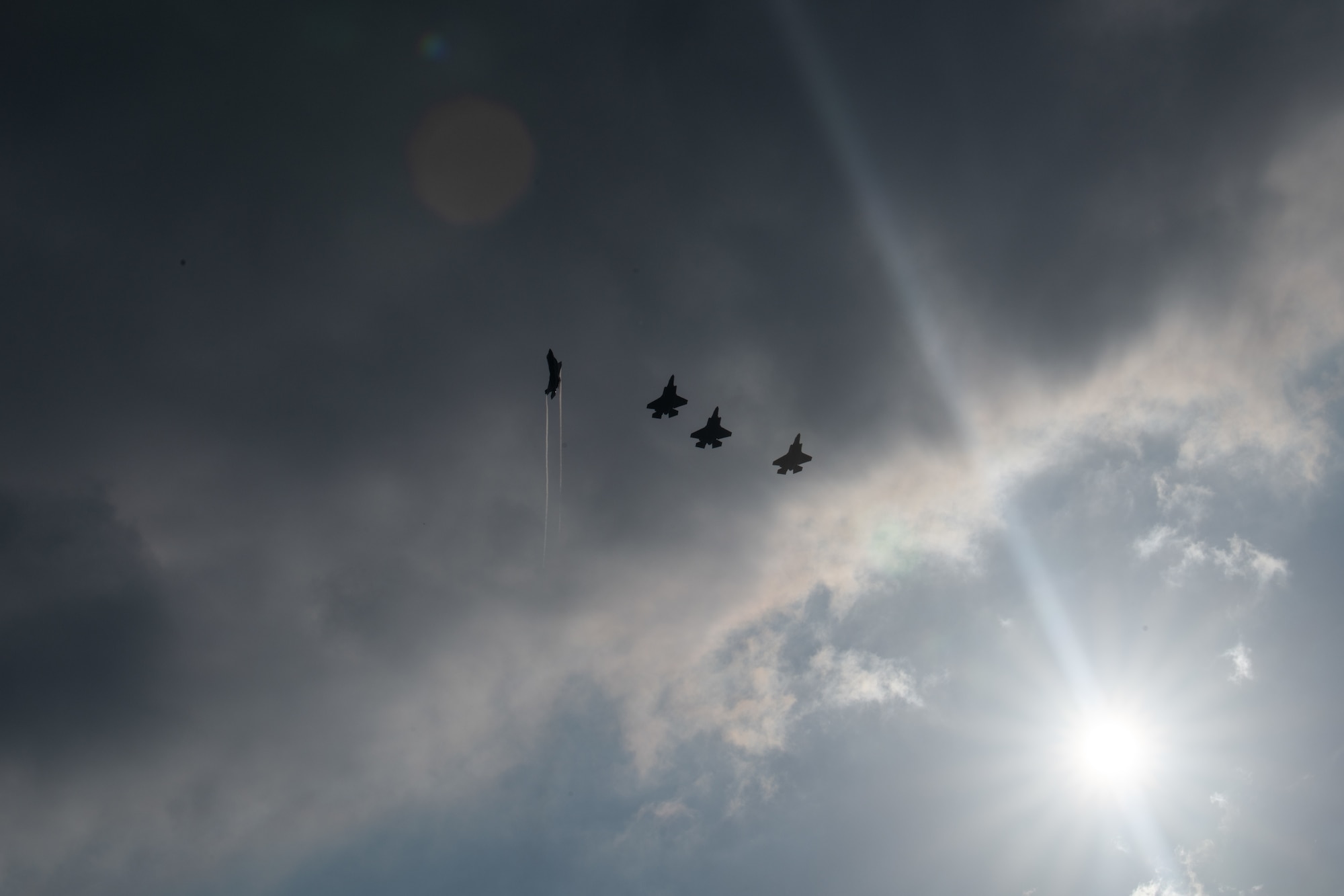 Jets fly across the sky.