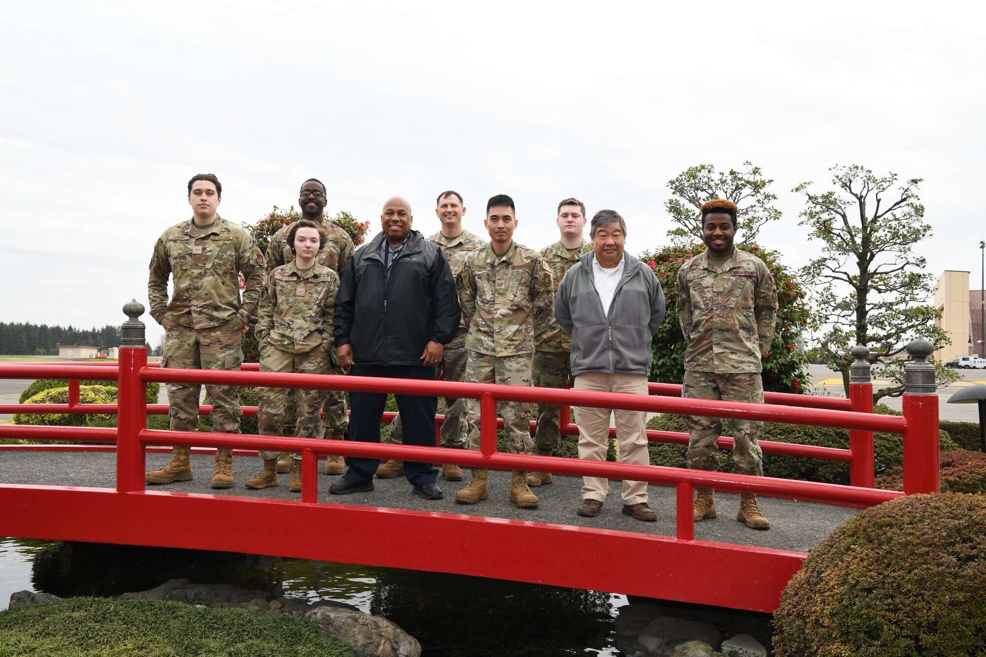 The 374th Operation Support Squadron airfield management flight poses for a photo at Yokota Air Base, March 27th, 2023. The 374th OSS Airmen’s creation of the first Landing Zone Safety Officer course to be certified by the Air Force Special Operations Command is one of many reasons they earned the 2022 Ronald B. McCarthy Airfield Management Facility of the Year. (U.S. Air Force photo by Senior Airman Spencer Tobler)