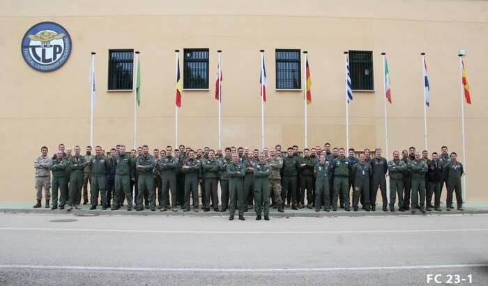 (Feb. 13, 2023) Members of Tactical Leadership Program Class 23.1 pose for a photo, Feb. 13, 2023. Carrier Air Wing (CVW) 7 is the offensive air and strike component of Carrier Strike Group (CSG) 10 and the George H.W. Bush CSG. The squadrons of CVW-7 are Strike Fighter Squadron (VFA) 86, VFA-103, VFA-136, VFA-143, Electronic Attack Squadron (VAQ) 140, Carrier Airborne Early Warning Squadron (VAW) 121, Helicopter Sea Combat Squadron (HSC) 5, and Helicopter Maritime Strike Squadron (HSM) 46. The George H.W. Bush CSG is on a scheduled deployment in the U.S. Naval Forces Europe area of operations, employed by U.S. Sixth Fleet to defend U.S., allied, and partner interests.