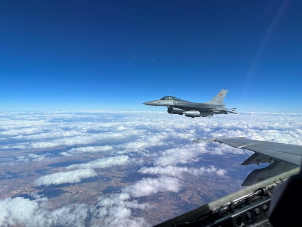 (March 1, 2023) A Belgian F-16 flies over Spain during a tactical Leadership Program event, Mar. 1, 2023. Carrier Air Wing (CVW) 7 is the offensive air and strike component of Carrier Strike Group (CSG) 10 and the George H.W. Bush CSG. The squadrons of CVW-7 are Strike Fighter Squadron (VFA) 86, VFA-103, VFA-136, VFA-143, Electronic Attack Squadron (VAQ) 140, Carrier Airborne Early Warning Squadron (VAW) 121, Helicopter Sea Combat Squadron (HSC) 5, and Helicopter Maritime Strike Squadron (HSM) 46. The George H.W. Bush CSG is on a scheduled deployment in the U.S. Naval Forces Europe area of operations, employed by U.S. Sixth Fleet to defend U.S., allied, and partner interests.