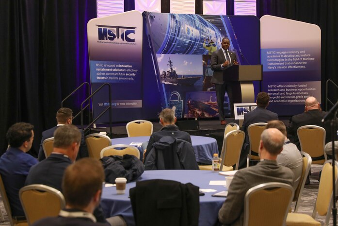 Naval Surface Warfare Center, Philadelphia Division (NSWCPD) Technical Director Nigel C. Thijs (SES) gives a speech on the critical role the Maritime Sustainment Technology Innovation Consortium (MSTIC) has with NSWCPD during the MSTIC-23-03 Collaboration Event at the Philadelphia Marriot Downtown on March 14, 2023. MSTIC is a collaboration executed under an Other Transaction Authority/Agreement (OTA) with the NSWCPD to develop and mature technologies that enhance the Navy’s mission effectiveness. (U.S. Navy photo by Sgt. Jermaine Sullivan/Released)