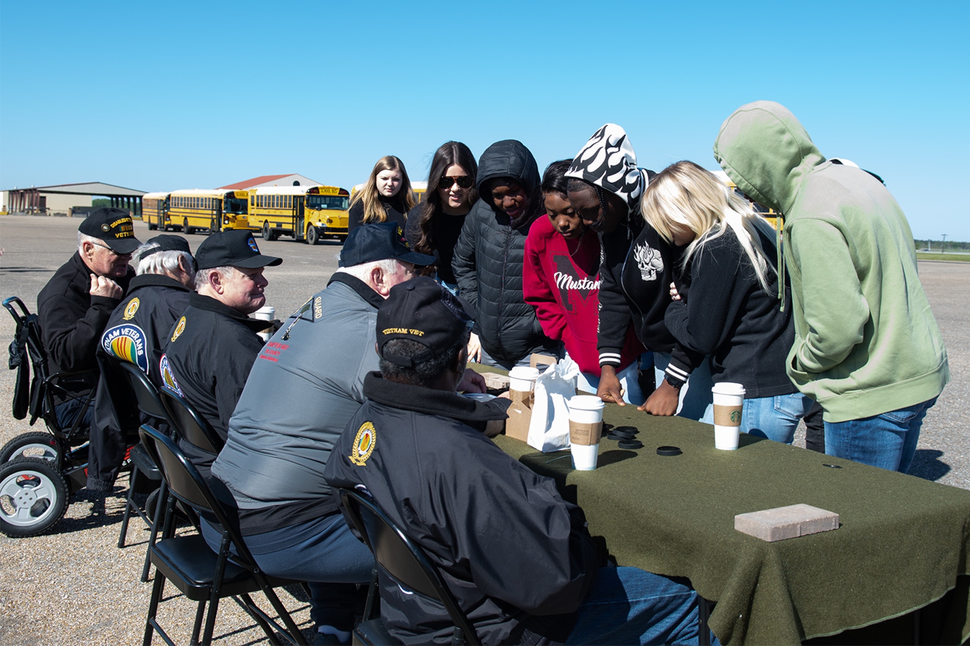 High school students meet Vietnam veterans at Maxwell Air Force base, March 14, 2023. River Region high school and middle school students visited the traveling wall display March 14. The more than 500 students also got a chance to talk with veterans invited to the base that day.