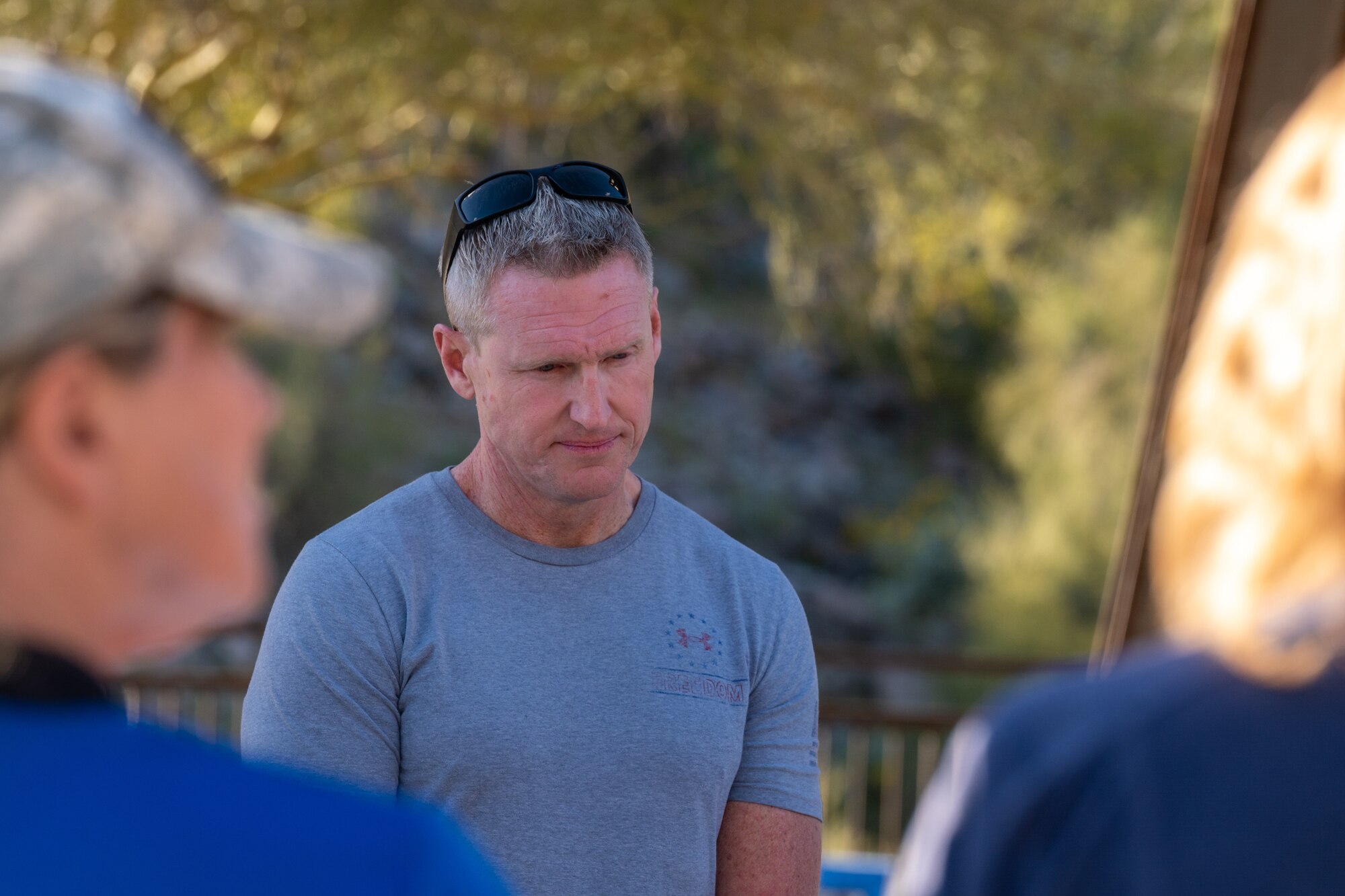 U.S. Air Force Brig. Gen. Jason M. Rueschhoff, 56th Fighter Wing commander speaks to participants of the Wear Blue: Run to Remember Piestewa Challenge March 26, 2023, at Piestewa Peak trailhead in Phoenix, Arizona.