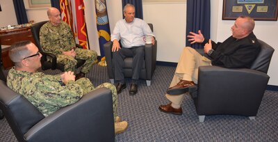 (March 28, 2023) NAVAL AIR STATION PENSACOLA, Fla. -- Force Master Chief Jason M. Haka (far right), Commander, Naval Air Forces, visits with members of Center for Naval Aviation Technical Training (CNATT) leadership March 28.  (From left) CNATT Command Master Chief Michael Marler, CNATT Executive Officer Capt. Jeffrey Brown, and CNATT Executive Director Mitch Allen.

Haka was in Pensacola to better familiarize himself with the aviation commands in the area.  While at CNATT,  he learned about the center's mission and progress with modernizing Naval Aviation training classrooms through the Ready Relevant Learning initiative.  (U.S. Navy photo)