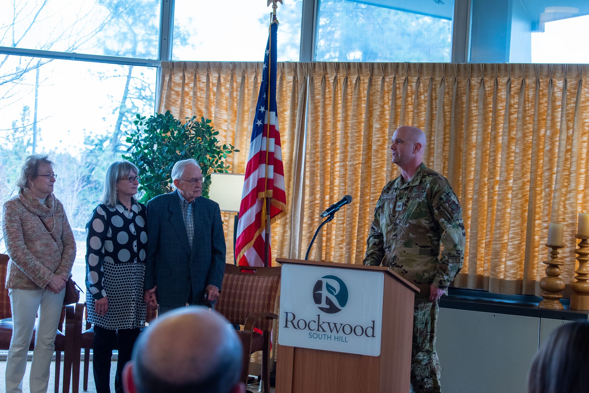 U.S. Air Force Col. Jeffrey Marshall, 92nd Air Refueling Wing vice commander gives a speech at Rockwood Retirement South Hill, March 20, 2023. Marshall commended retired U.S. Air Force Maj. Stan Bennet, WWII veteran and centurion at a recognition ceremony held for Bennet. (U.S. Air Force photo by Airman 1st Class Lillian Patterson)