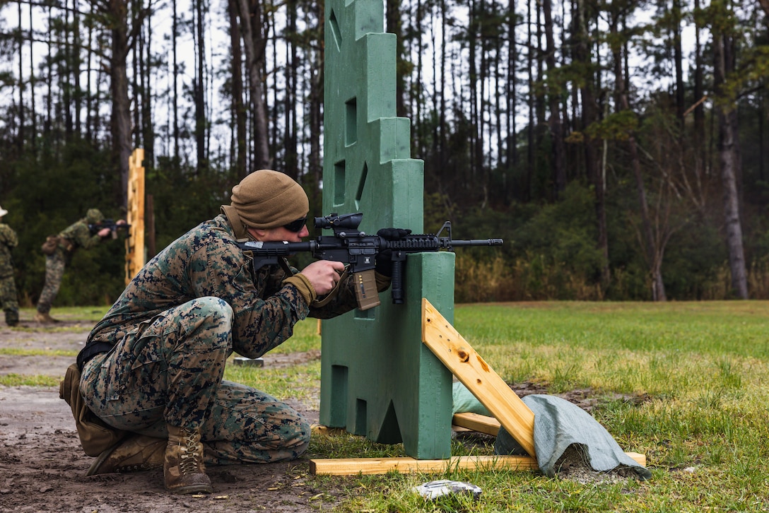 U.S. Marine Corps Staff Sgt. Jack Gnosca, the content management team chief with Marine Corps Installations East-Marine Corps Base (MCB) Camp Lejeune, fires a rifle during the 2023 Marine Corps Marksmanship Competition East on Stone Bay, MCB Camp Lejeune, North Carolina, March 10, 2023. All Marines east of the Mississippi were invited to attend this annual competition to increase their combat effectiveness and lethality using MCB Camp Lejeune's premier ranges. (U.S. Marine Corps photo by Cpl. Jennifer E. Douds)
