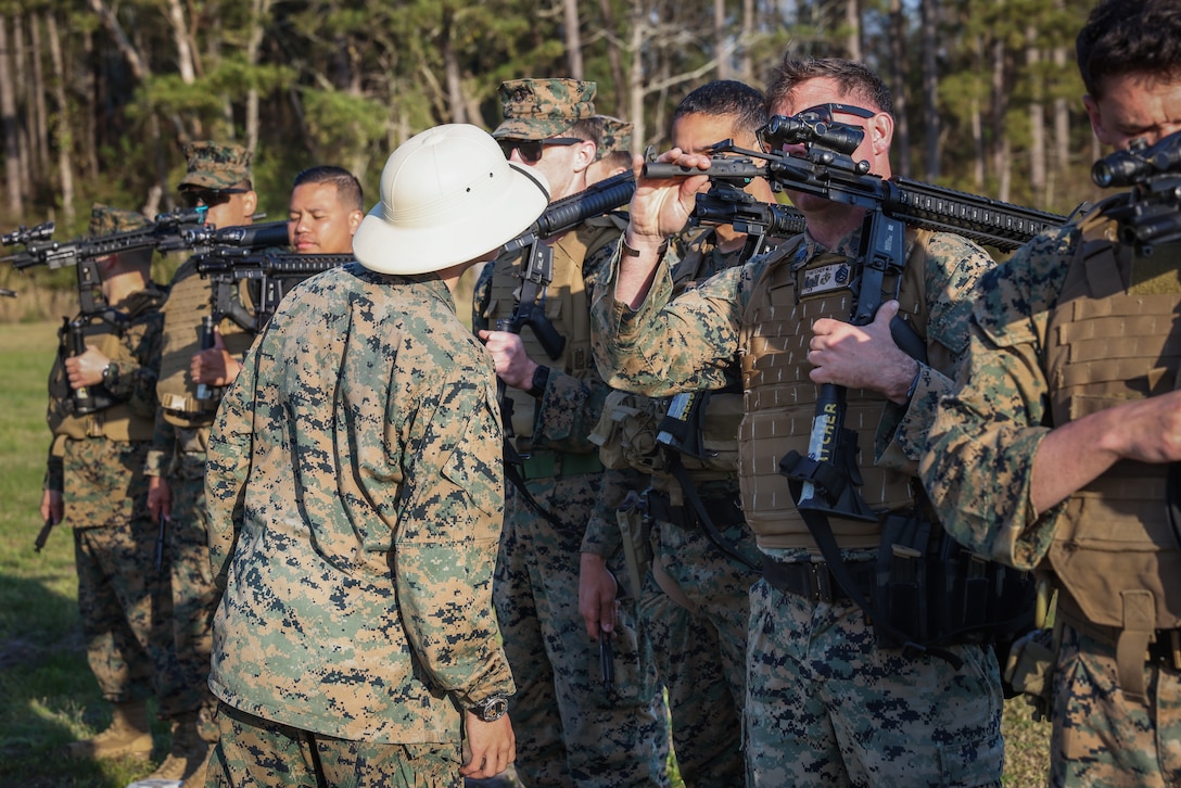 U.S. Marine competitors conduct a rifle functions check during the 2023 Marine Corps Marksmanship Competition East on Stone Bay, Marine Corps Base (MCB) Camp Lejeune, North Carolina, March 7, 2023. All Marines east of the Mississippi were invited to attend this annual competition to increase their combat effectiveness and lethality using MCB Camp Lejeune's premier ranges. (U.S. Marine Corps photo by Cpl. Jennifer E. Douds)