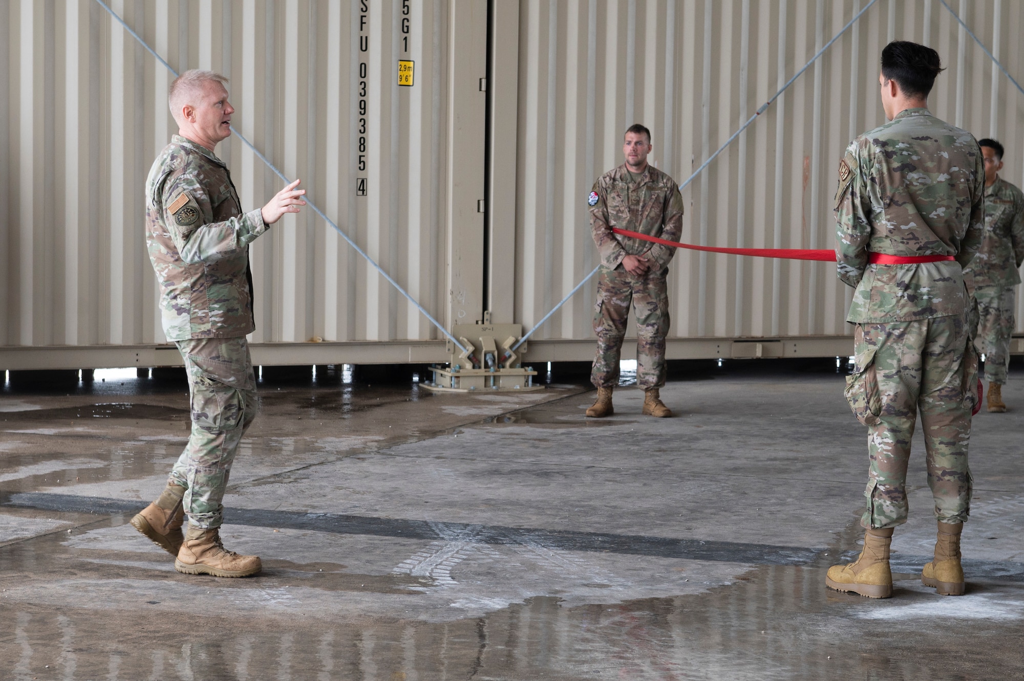 U.S. Air Force Brig. Gen. Paul Birch, 36th Wing commander, speaks during the Expedient Small Asset Protection Shelter system ribbon cutting ceremony on Andersen Air Force Base, Guam, Feb. 24, 2023. The ESAP is a rapidly-constructed, deployable steel shelter, designed to be used in any environment and to greatly enhance U.S. forces’ ability to operate from locations at a higher capacity, ensuring Airmen and aircrews are postured to respond across the spectrum of military operations. (U.S. Air Force photo by Airman 1st Class Spencer Perkins)