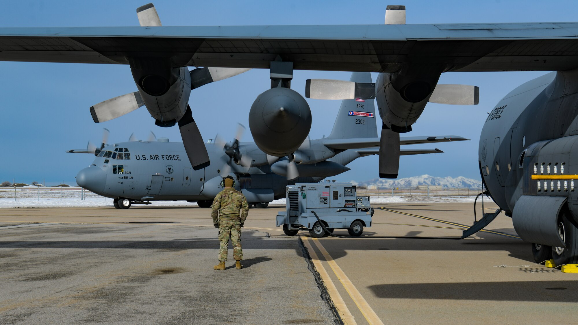 An aerial spray-modified C-130H Hercules aircraft assigned to the 910th Airlift Wing, Youngstown Air Reserve Station, Ohio, lands at Hill Air Force Base, Utah, on March 14, 2023.