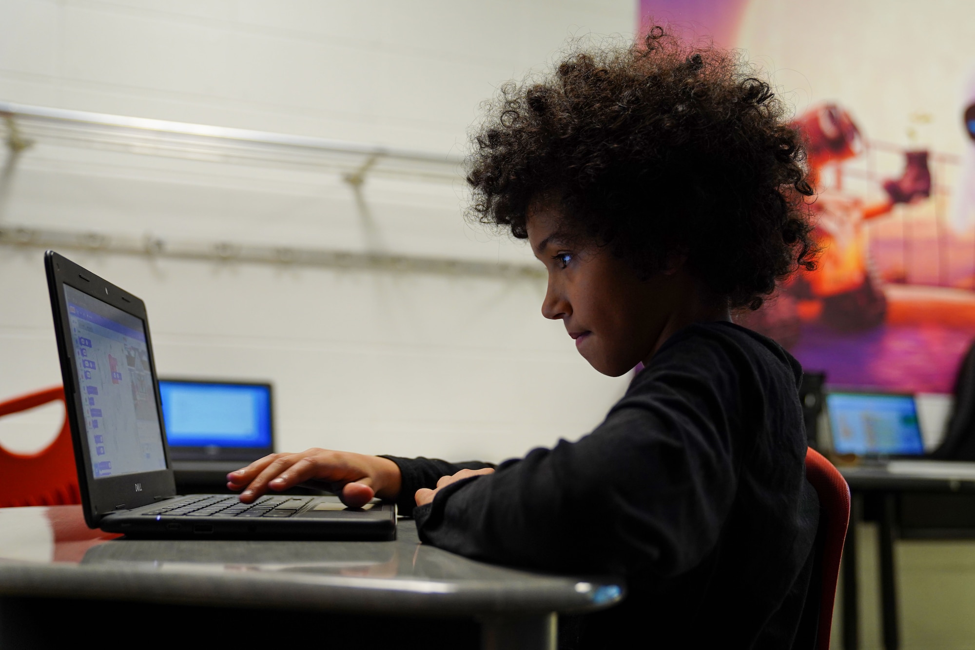 Back Bay Elementary student creates basic algorithm blocks at Back Bay Elementary School on March 23, 2023. The 336 TRS has collaborated with Back Bay Elementary to teach 4th grade students the basics of programing through a seven week course.