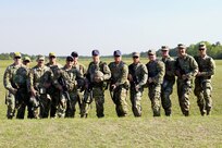 Soldiers from the 85th U.S. Army Reserve Support Command pause for a group photo during the 2023 U.S. Army Small Arms Championship at Fort Benning, GA. March. 15, 2023.