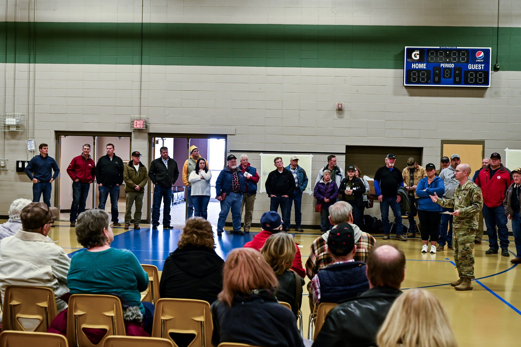 Lt. Col. Eric Green, Sentinel Program integration officer, welcomes landowners and the community during a town meeting for Laramie County to discuss real estate activities and future negotiations to support the project. The Air Force discussed the temporary construction easements for utility corridors and launch facilities and missile alert facilities conversion; the new permanent easements for utility corridors; drainage easements for LF and MAF sites converted to the new Sentinel Launch Centers; road access to new tower sites; and fee acquisitions for five-acre tower sites. (U.S. Air Force photos by Joseph Coslett Jr.)
