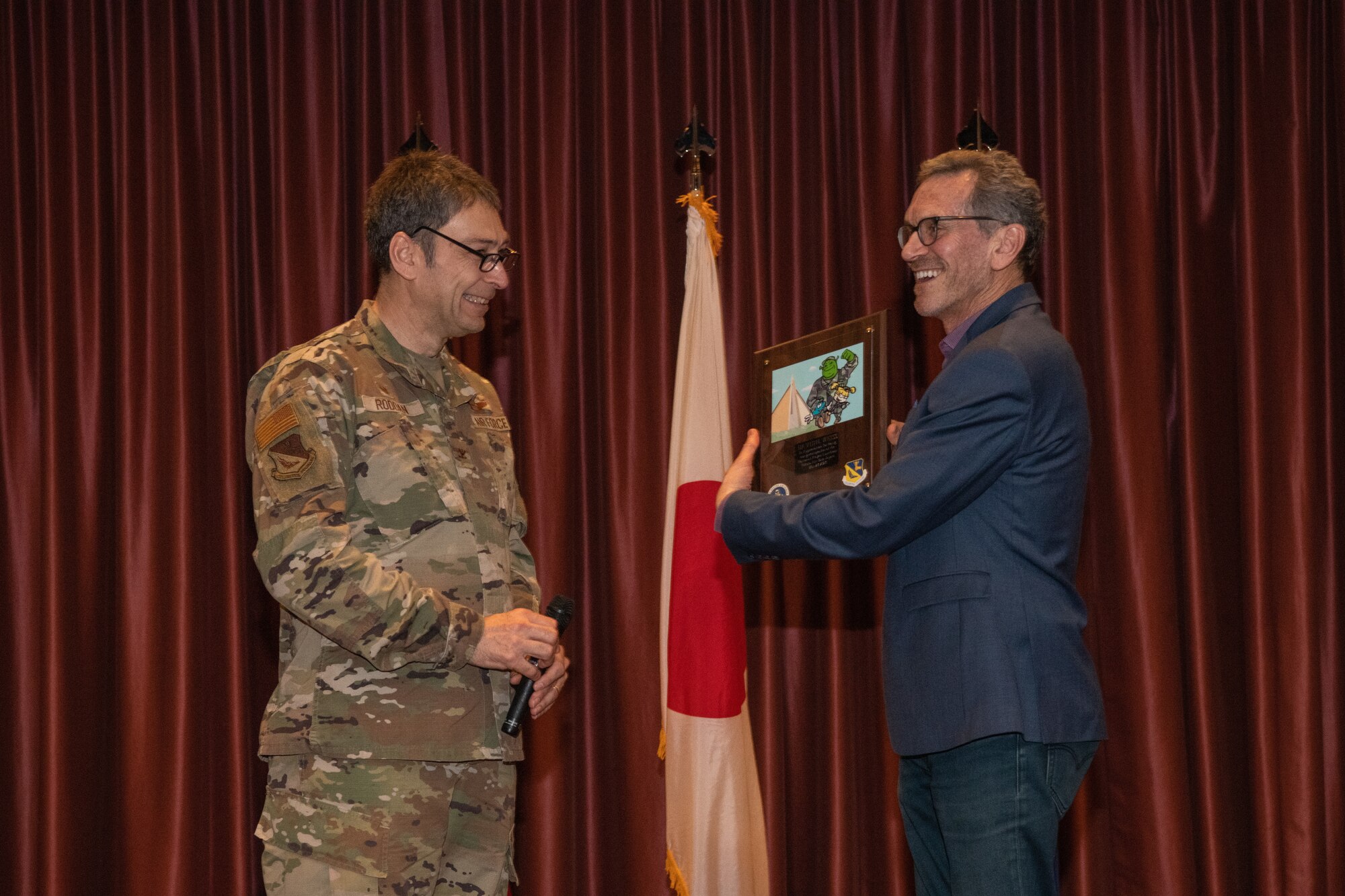 presentation of a plaque as a gift
