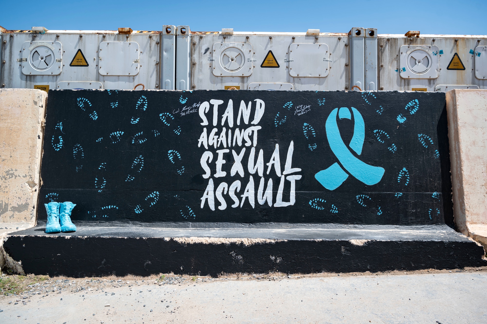 A mural is painted to recognize Sexual Assault Awareness and Prevention month at Ali Al Salem Air Base, Kuwait, March 27, 2023.