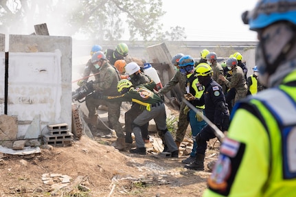 Service members from participating nations and members of the Humanitarian Assistance Disaster Relief Institute demonstrate a collapsed building rescue during Exercise Cobra Gold 2023 at the Disaster Relief Training Center in Chachoengsao province, Kingdom of Thailand, March 4, 2023. At the demonstration leaders from participating nations discussed how their nations can combine capabilities in response to regional crises.