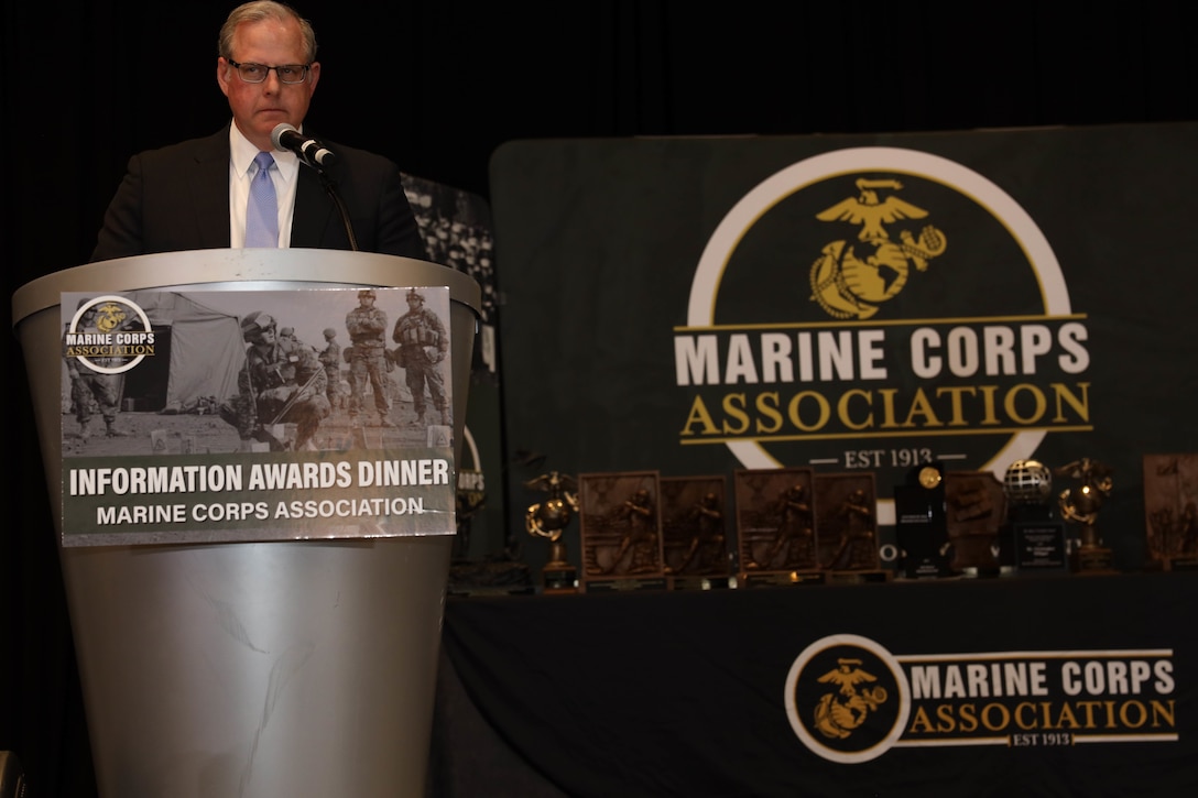 John Sherman, Department of Defense (DoD) Chief Information Officer (CIO), gives the keynote speech during the third annual Marine Corps Association Information Awards Dinner in Arlington, Virginia, April 14, 2022. The event was administered by the Deputy Commandant for Information, which recognized Marines, civilians and units across the Marine Corps for their outstanding performance and impact in the information environment. “As we look at information, data, technology, intelligence we live in a new battlespace,” stated Mr. Sherman. “Your job and what you are doing so well is getting that technology, that data, that new type of innovation to where it needs to be because that’s what is going to win here in the 21st Century.” (U.S. Marine Corps photo by Lance Cpl. Christine Phelps)