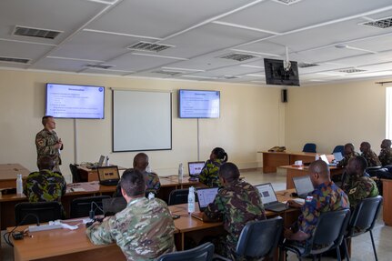 U.S. Army Illinois National Guard Chief Warrant Officer Cory Richardson, with the 176th Cyber Protection Team, speaks at the Cyber Awareness Course during exercise Justified Accord 23 (JA23) in Nairobi, Kenya, Feb. 21, 2023.