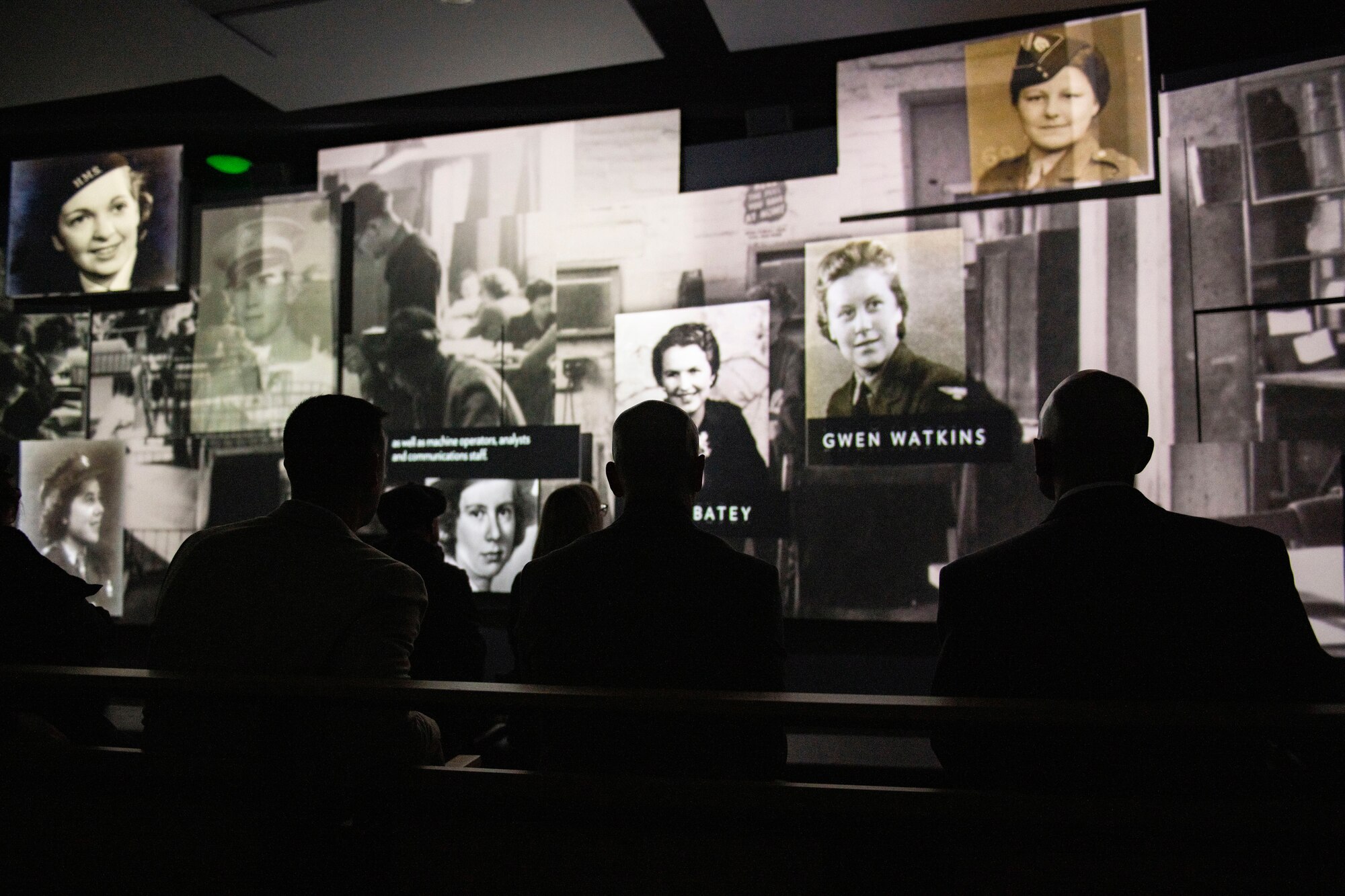 Leadership from the 501st Combat Support Wing watch a video at Bletchley Park