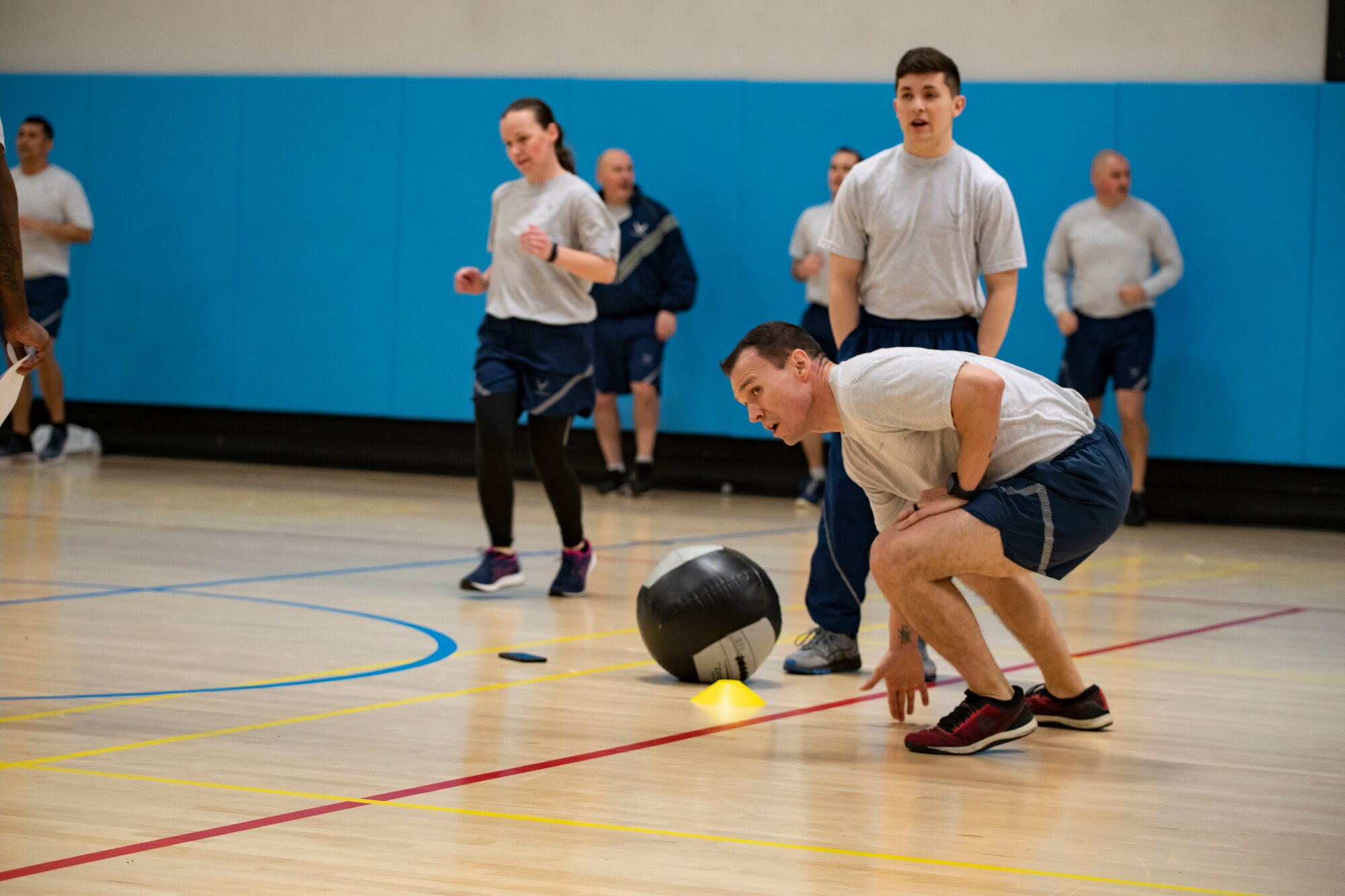 Leadership from the 501st Combat Support Wing participate in a physical training session at RAF Croughton