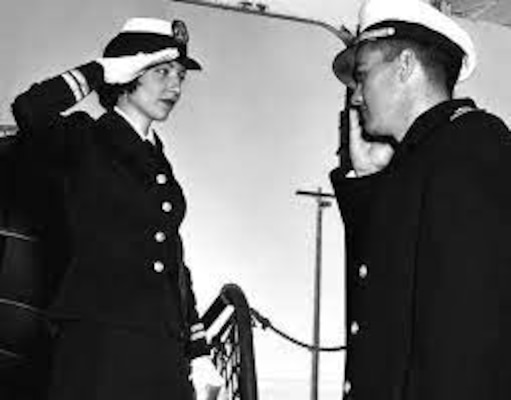 Black and white photo of Lt. CHarlene Juneson in uniform on the left saluting