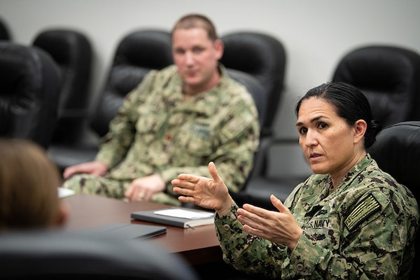 Seiko Okano in uniform leads a group mentoring session with Naval Surface Warfare Center