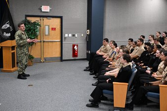 DAHLGREN, Va. (March 28, 2023) Surface Combat Systems Training Command’s (SCSTC) Commodore, Capt. George A. Kessler, Jr., speaks to cadets and instructors from Stafford High School’s Navy Junior Reserve Officer's Training Corps (NJROTC) during their visit to Naval Support Facility Dahlgren, March 28. Over thirty-five cadets visited SCSTC, its co-located learning site SCSTC AEGIS Training and Readiness Center (ATRC), and Naval Surface Warfare Center Dahlgren Division (NSWCDD) as part of an effort to help potential future warfighters learn more about the different careers and opportunities found in the U.S. Navy. (U.S. Navy photo by Michael Bova)