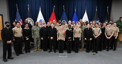 DAHLGREN, Va. (March 28, 2023) Cadets and instructors from Stafford High School’s Navy Junior Reserve Officer's Training Corps (NJROTC) pose for a group photo with leadership from Surface Combat Systems Training Command (SCSTC), its co-located learning site SCSTC AEGIS Training and Readiness Center (ATRC), and Naval Surface Warfare Center Dahlgren Division (NSWCDD) during their visit to Naval Support Facility Dahlgren, March 28. Over thirty-five cadets visited as part of an effort to help potential future warfighters learn more about the different careers and opportunities found in the U.S. Navy. (U.S. Navy photo by Michael Bova)
