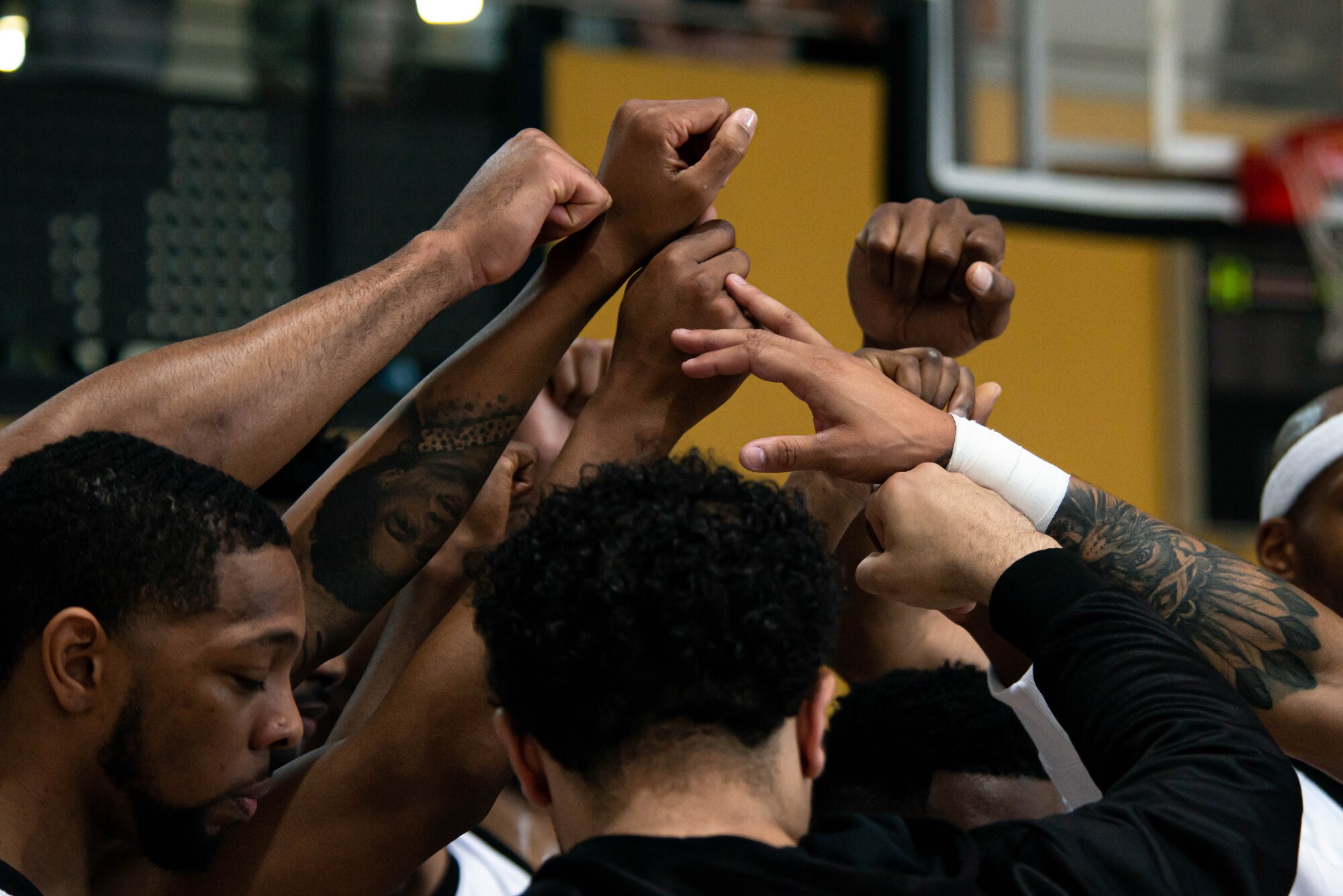 Players gather before game begins.