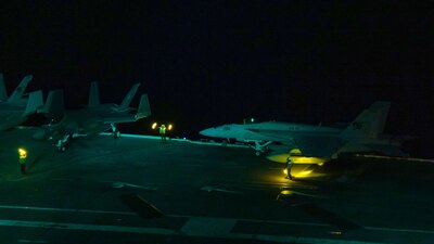 USS Carl Vinson (CVN 70) conducts night flight operations.