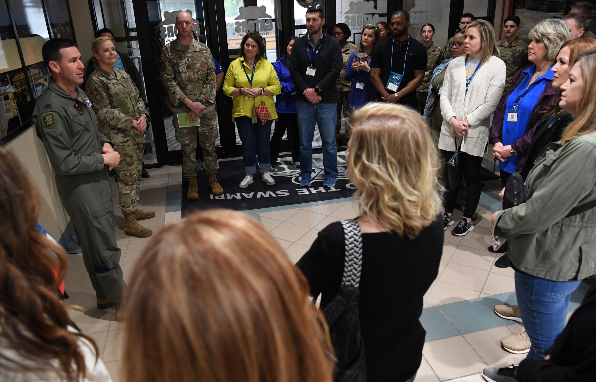 U.S. Air Force Col. Jason Allen, 81st Training Wing vice commander, and Chief Master Sgt. Sarah Esparza, 81st TRW command chief, deliver welcoming remarks to members of the Association for Career and Technical Education inside Cody Hall at Keesler Air Force Base, Mississippi, March 29, 2023.