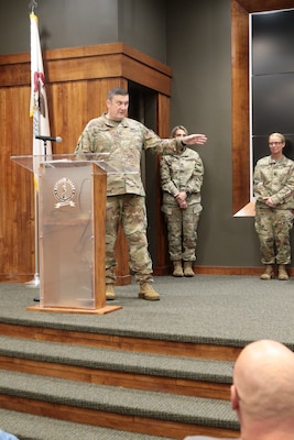 Col. Lenny Williams, Chief of Staff for the Illinois Army National Guard, speaks during the retirement ceremony of Chief Warrant Officer 4, Lindsay Glynn March 4, 2023.
