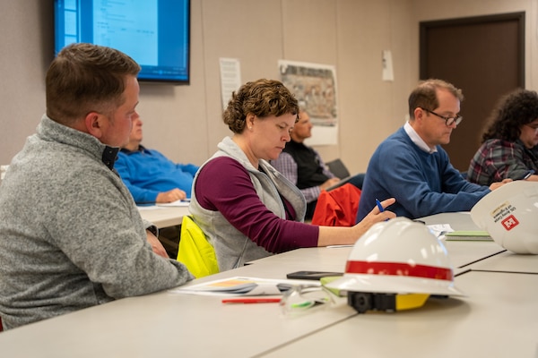 Tara O'Leary, Deputy Chief of the Veterans Affairs Division and Louisville VAMC project manager, provides an update on the status of construction of the Louisville VA Medical Center to members of the Senior Advisory Group for the project Nov. 11, 2022.